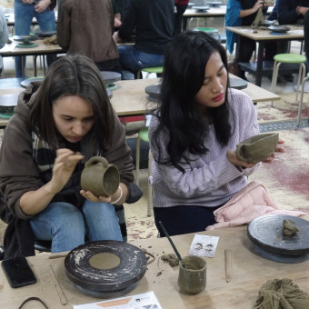 As a hands-on cultural learning experience, we try our hand at ceramics.